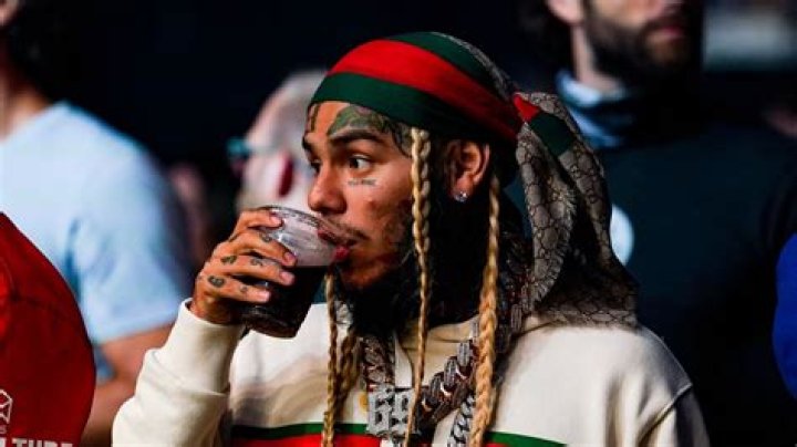 6ix9ine Downs Bottle of Vodka and Defends Kanye West on Andrew Tate’s Podcast