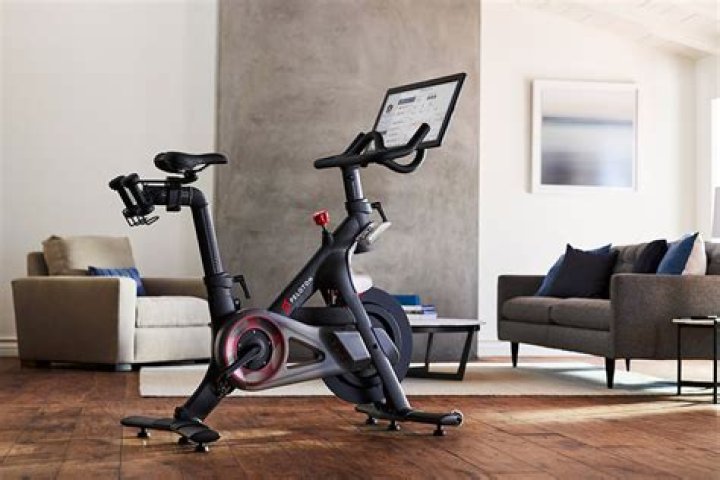 Amanda Holden In Workout Gear Rides Peloton Bike With Cocktail Shaker