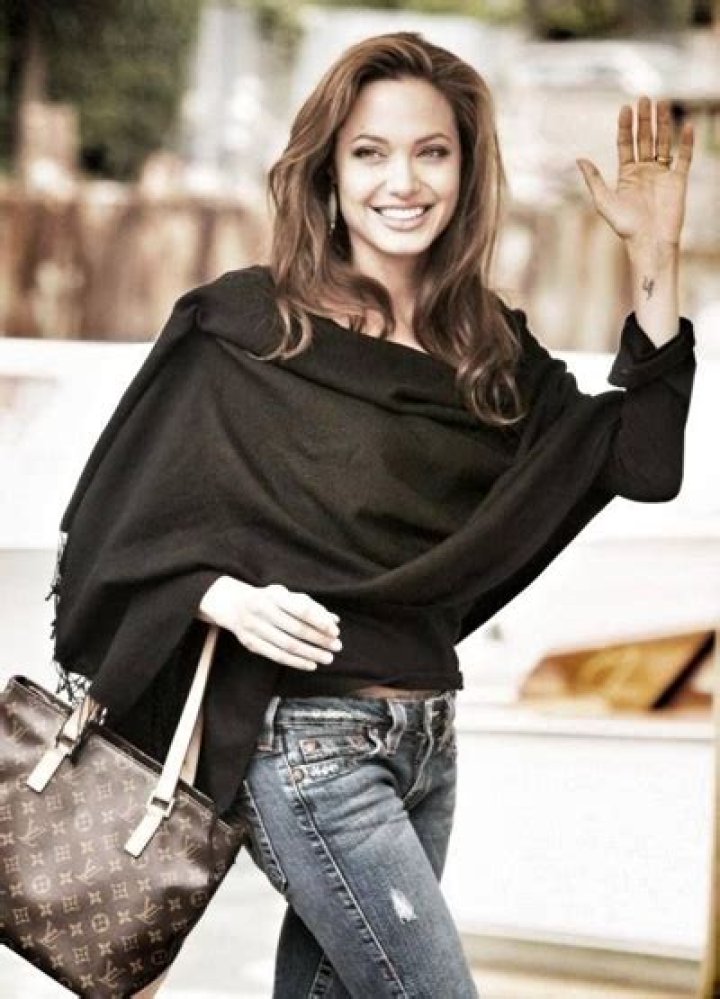 Angelina Jolie Favorite Things Color Food Music Books Perfume Lipstick Facts