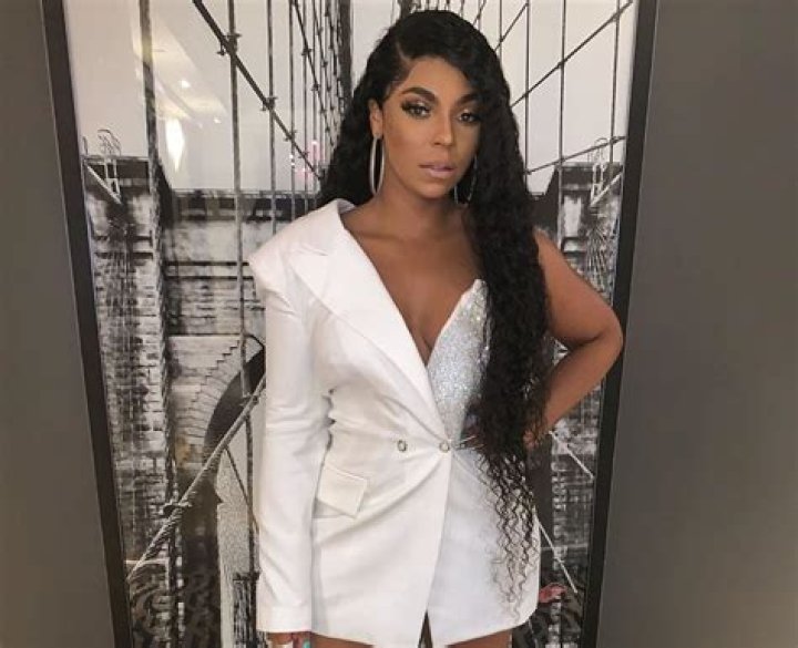Ashanti Leaves Nothing To The Imagination In Pink Bathing Suit Pictures — Fans Say Nelly Was Wrong To Let Her Go