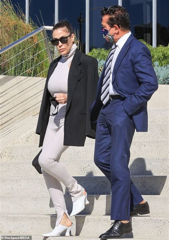 Dr. Dre’s Wife Nicole Young Seen Walking Out Of Lawyer’s Office In LA