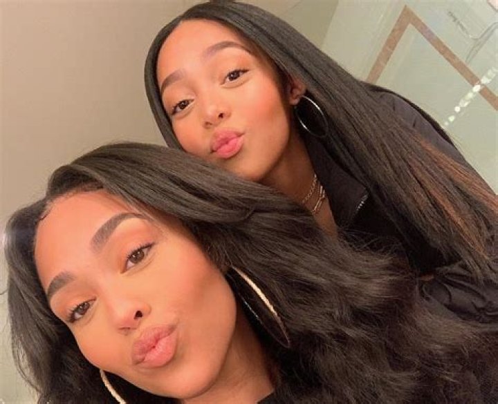 Jordyn Woods And Her ‘Twin’ Sister Jodie Woods Debut Stunning Hairstyles In New Video — The Glow-Up Since Leaving The Kardashians Is Astonishing