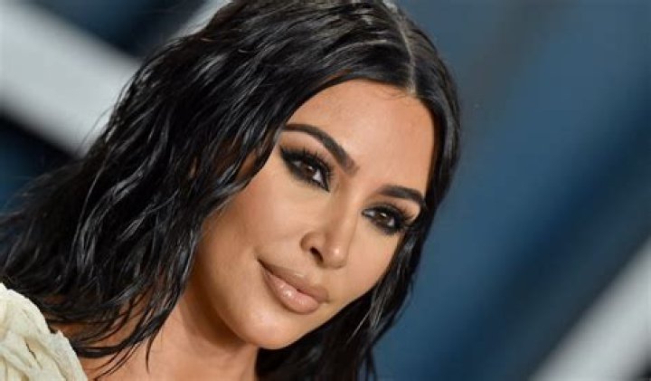 Kim Kardashian Shares Swimsuit Photo Saying "Risk and You Shall Receive" — Celebwell