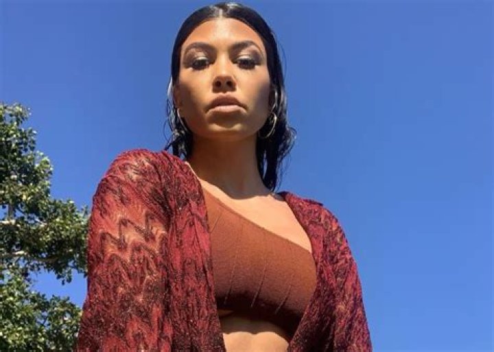 Kourtney Kardashian Flaunts Her Curves In Blue Microkini With Addison Rae As Some Say The Photos Are Weird