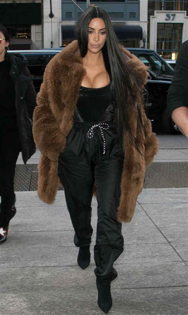 KUWTK: Kim Kardashian Rocks Open Cardigan With Nothing Underneath And Short Leather Skirt In Rome