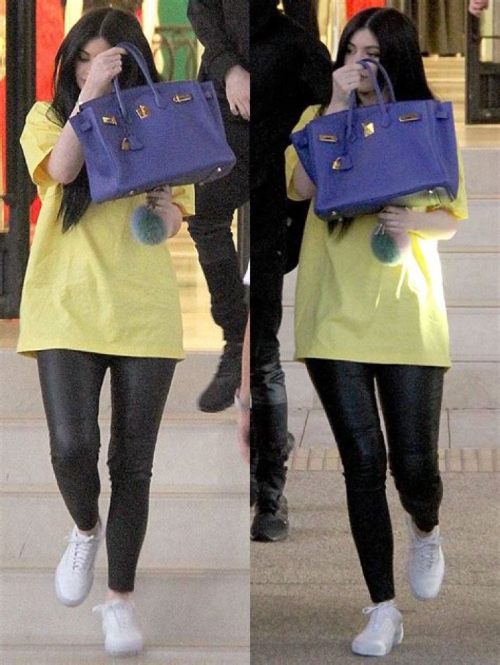 Kylie Jenner Hides Her Face While Dressed In Blue Vegan Leather