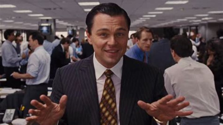 Leonardo DiCaprio Shows Us The Money In New The Wolf Of Wall Street Stills