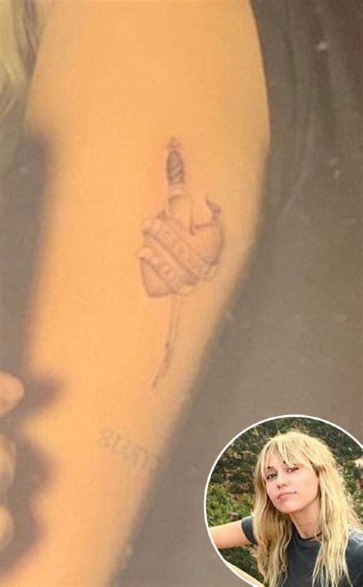 Miley Cyrus Shows Off Her New Bleeding Heart Tattoo – Inspired By Her New Romance With Cody Simpson?