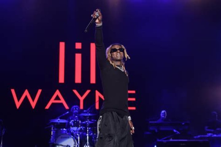 Reginae Carter Poses With Her Dad And Fans Say She Is Twinning With Lil Wayne