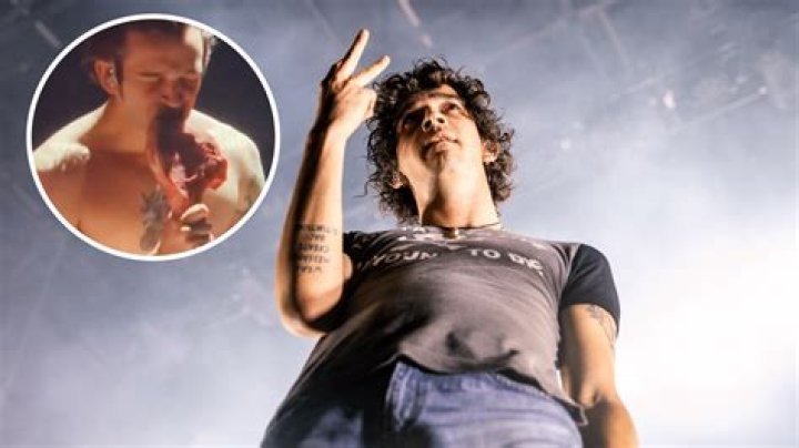 The 1975’s live show features Matty Healy eating a chunk of raw meat, proving 2022 just won’t stop