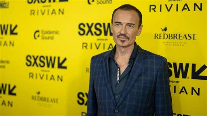 What disease does Julian McMahon have?