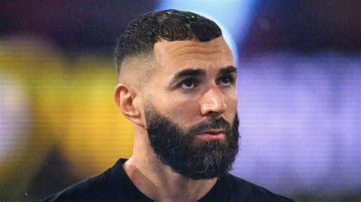 Who is Karim Benzema's brother who is a retired footballer?