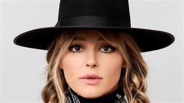 Yellowstone Star Hassie Harrison Shares Swimsuit Photo From "the Beach"